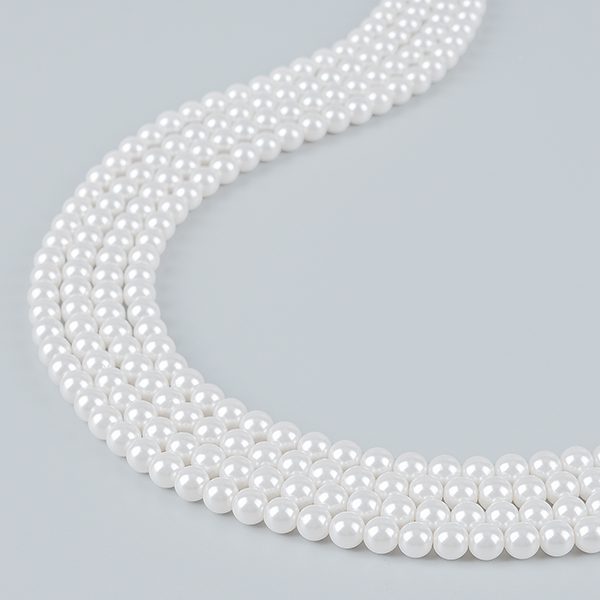 Cultured round natural pearls